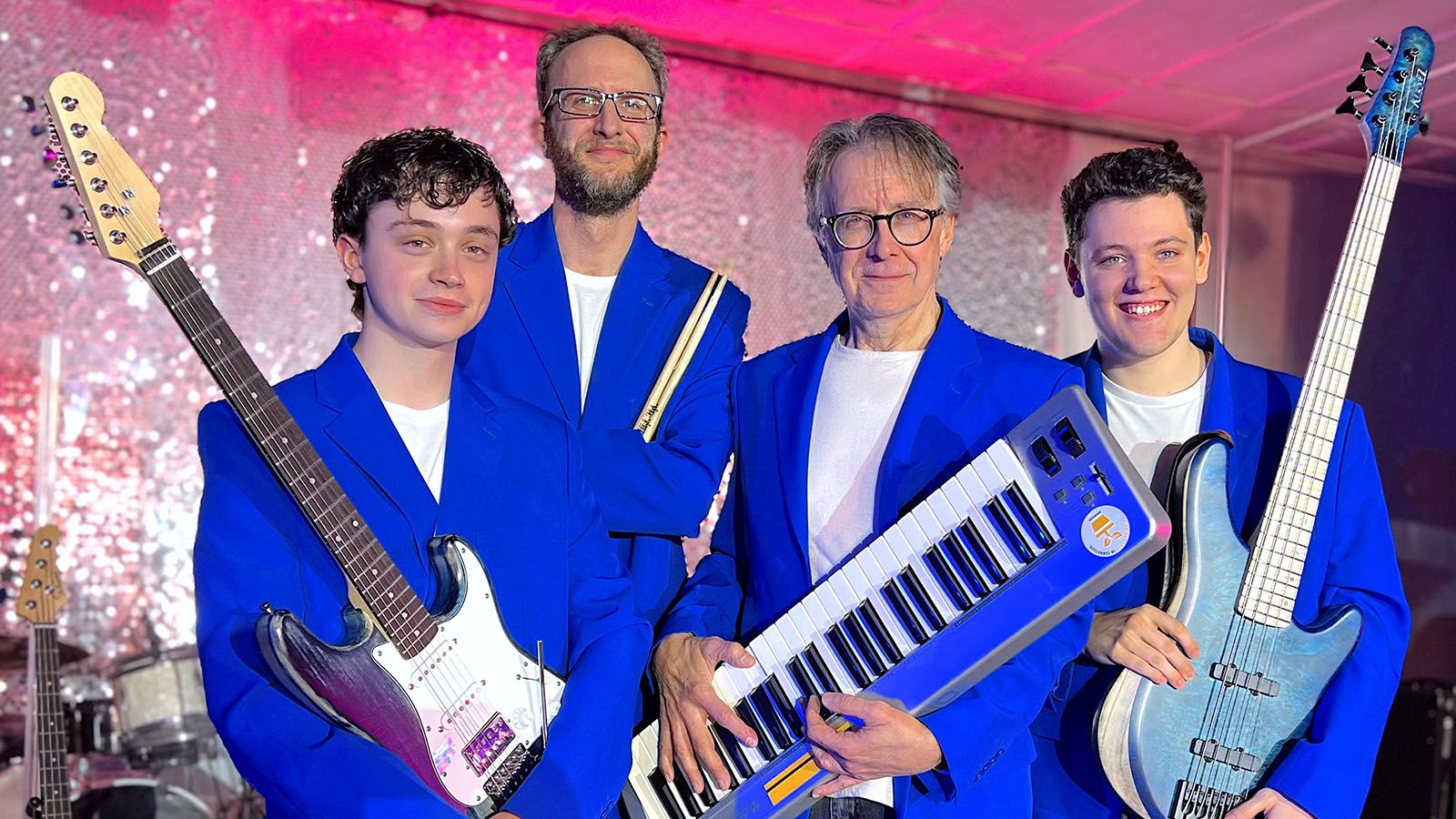 Summit City Music Theatre is using a live band, from left, Tyler Crisp, Carl Bleke, music director Rolin Mains, and Trevor Perkins, for The Wedding Singer, which continues this weekend.