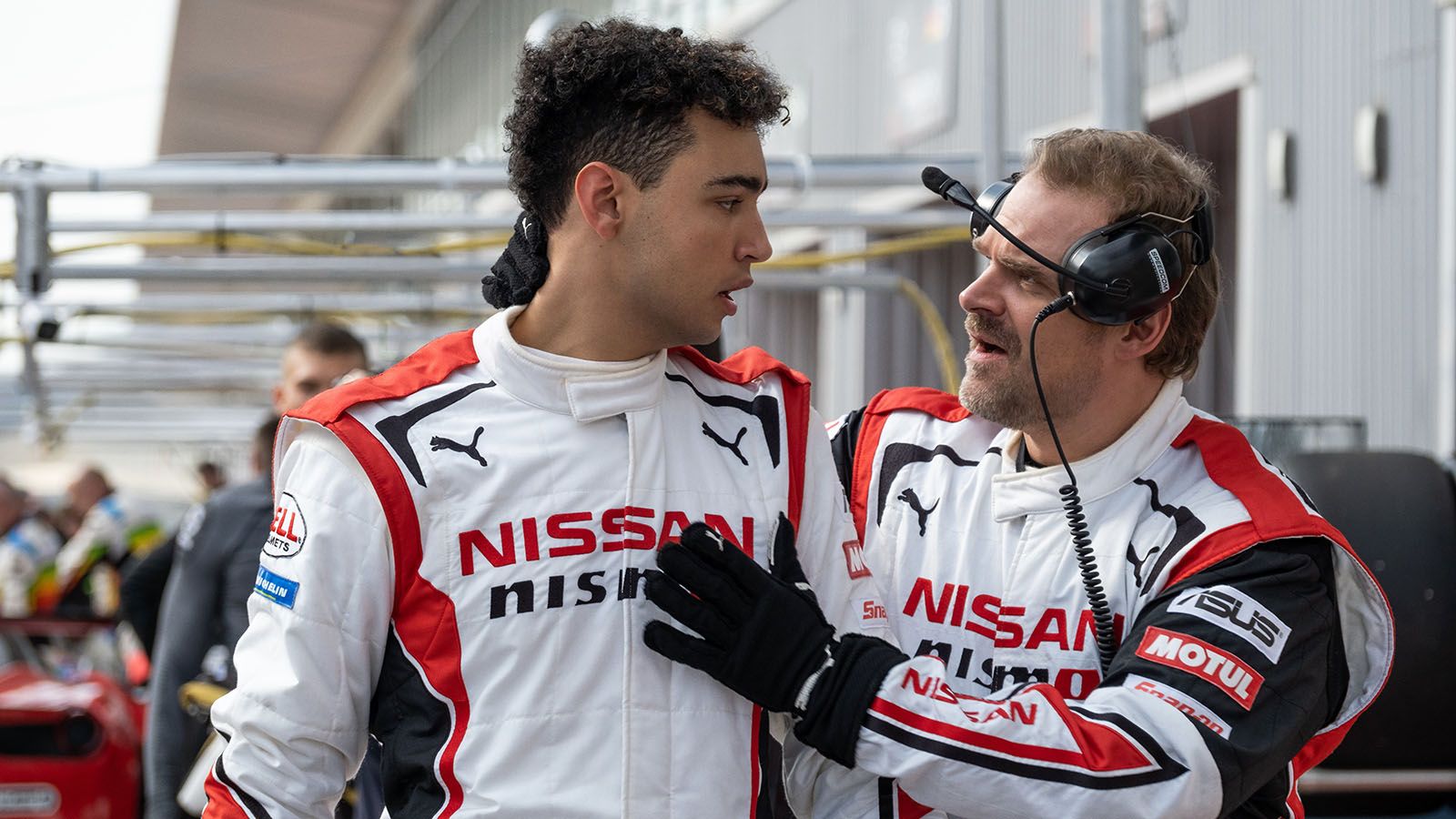 Archie Madekwe, left, and David Harbour star in Gran Turismo.