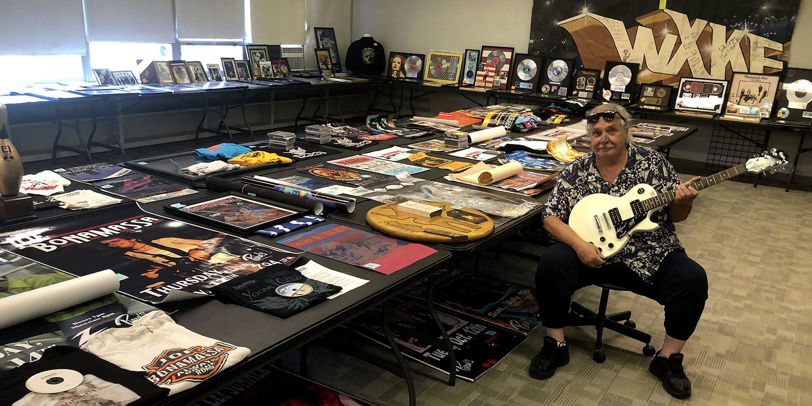 WXKE DJ Doc West will be auctioning off his rock memorabilia.