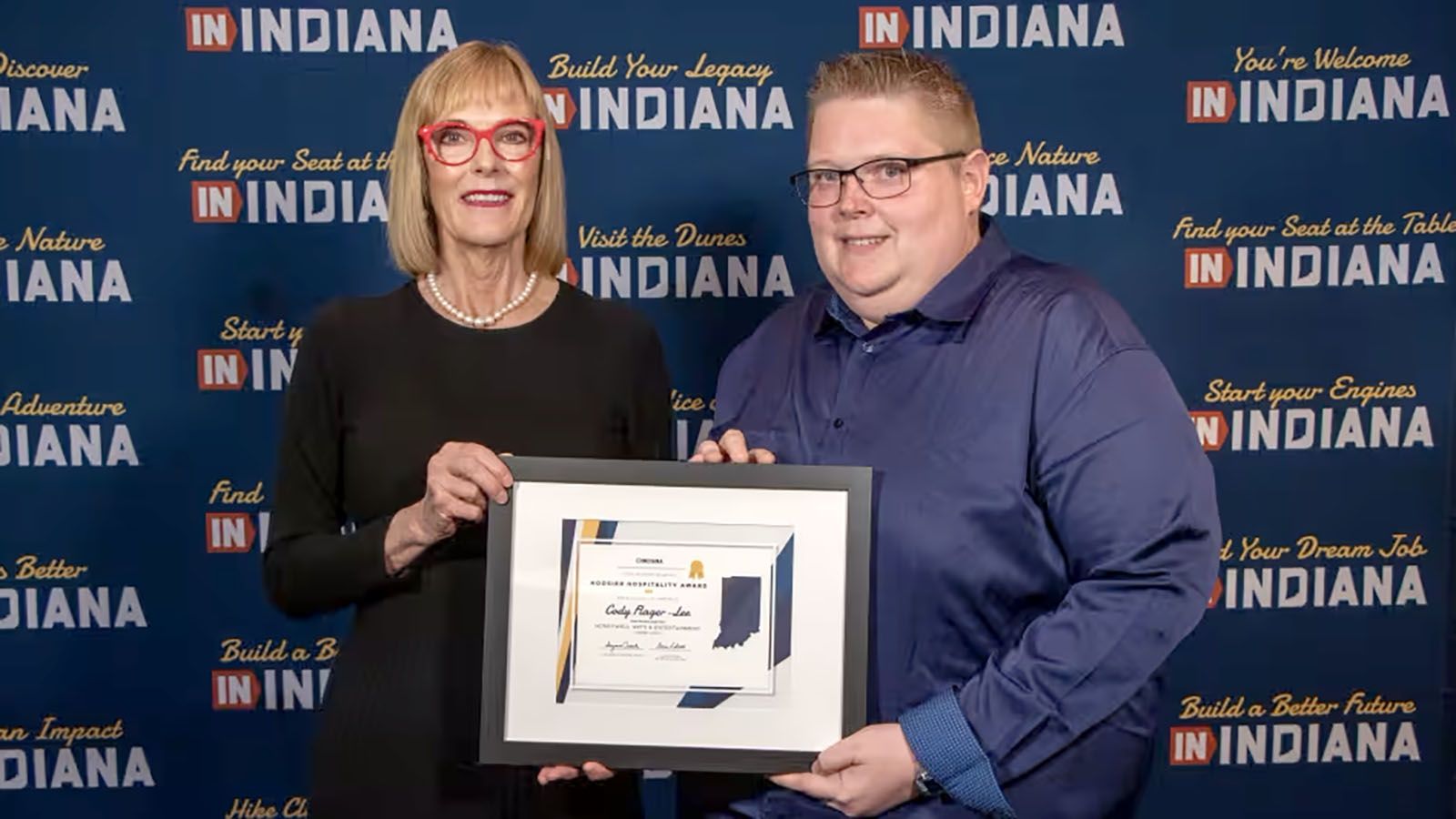 Cody Flager-Lee, guest relations supervisor for Honeywell Arts & Entertainment, was recently given a Hoosier Hospitalty Award by Lt. Gov. Suzanne Crouch.