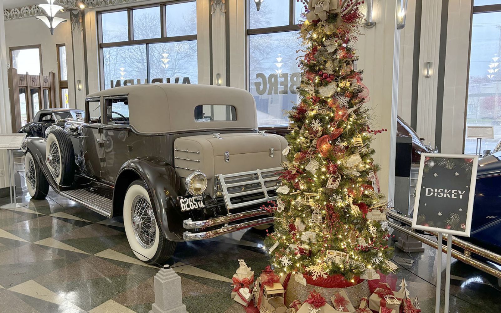 Beautifully decorated trees intermingle with classic cars at Auburn Cord Duesenberg Automobile Museum, beginning Nov. 29.