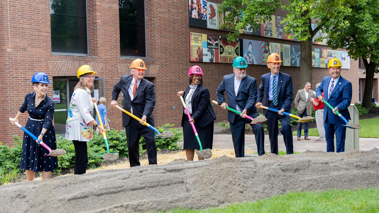 City and Arts United officials take part in a ceremonial ground breaking for Arts United Center.