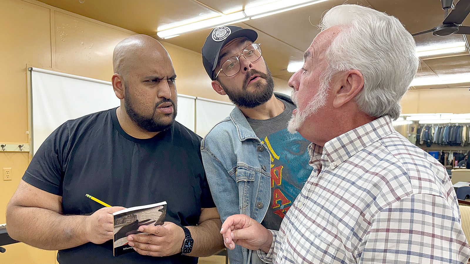 From left, Dimitri Wijesinghe, Joseph Adams, and Scott Rumage rehearse a scene for the upcoming production of Murdered to Death at Arena Dinner Theatre. The show, a spoof on the popular Agatha Christie whodunit genre, opens Friday, Oct. 25.