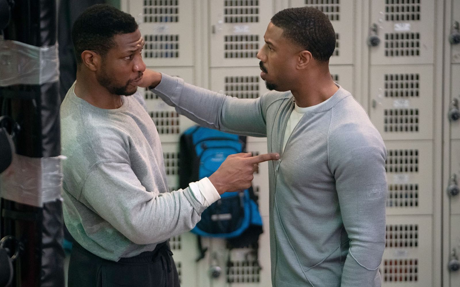 Jonathan Majors, left, and Michael B. Jordan star in the No. 1 movie in the country, Creed III.