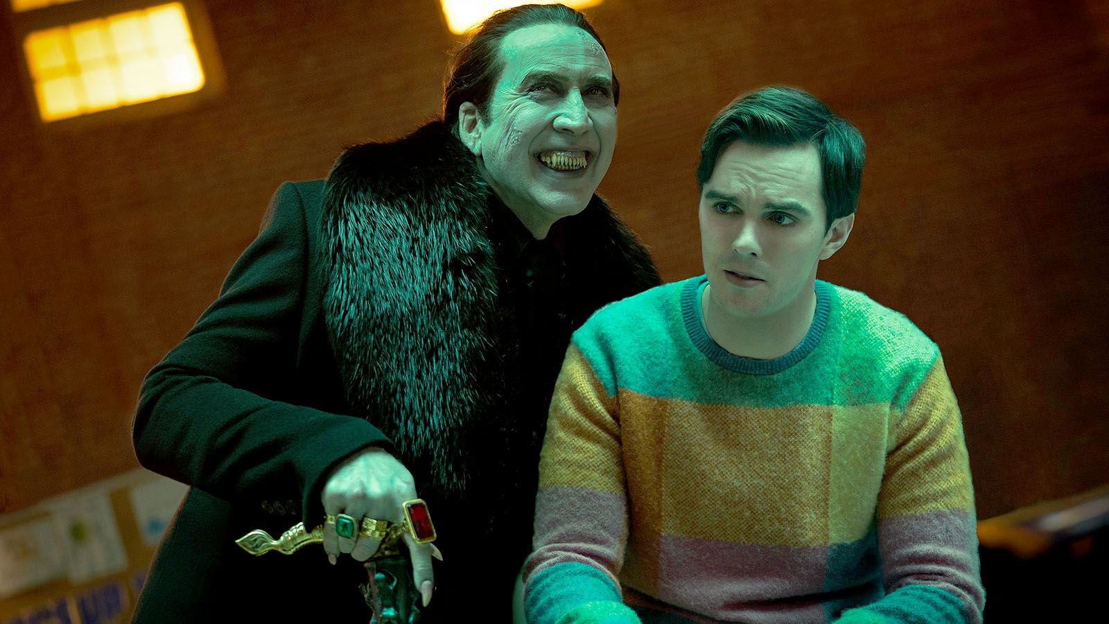Nicolas Cage, left, and Nicholas Hault star in the new comedy/horror/fantasy film Renfield.