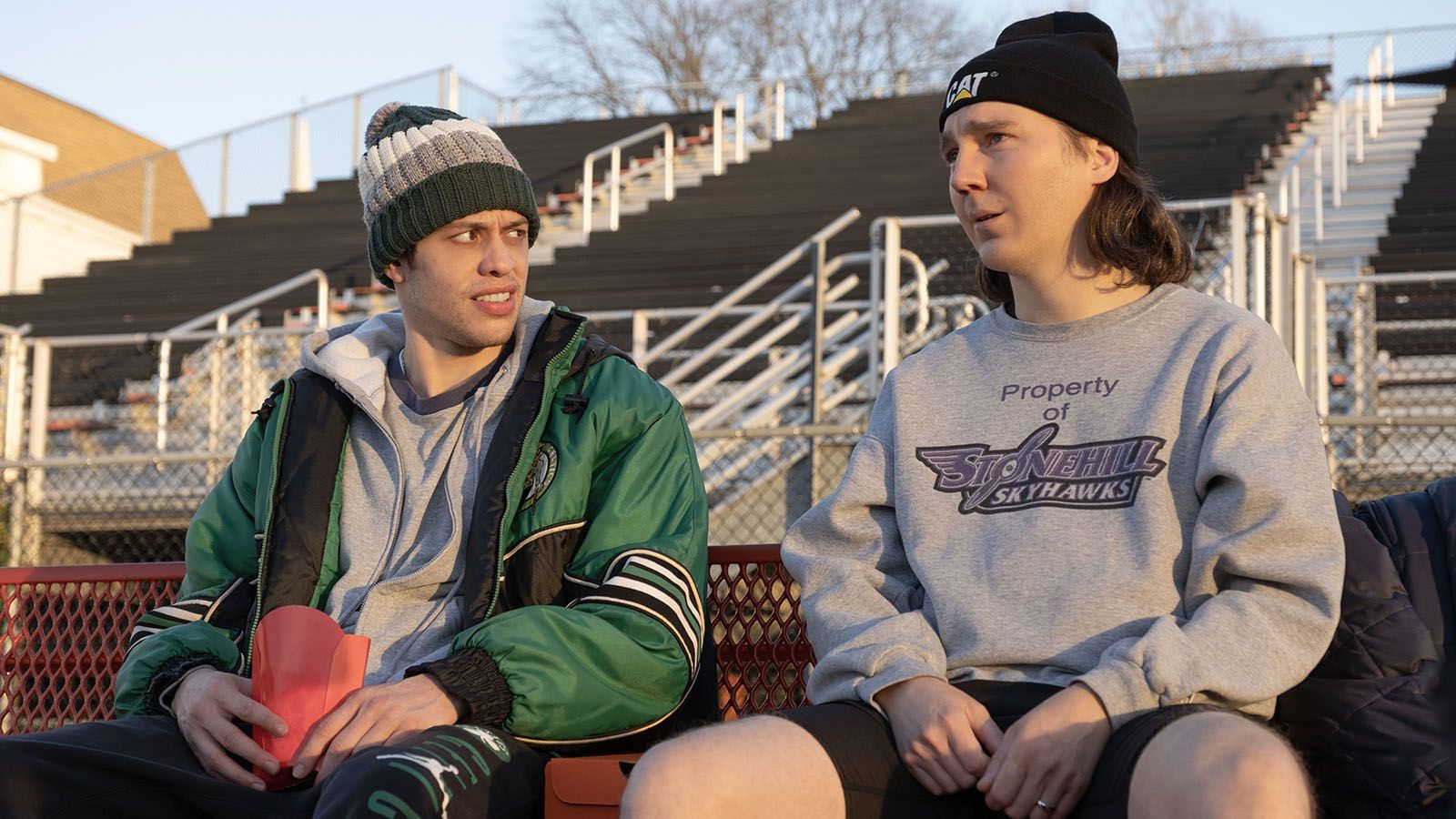 Pete Davidson, left, and Paul Dano portray brothers in the new film Dumb Money.