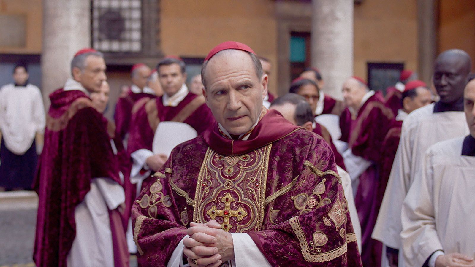 Ralph Fiennes portrays Cardinal-Dean Thomas Lawrence who is tasked with finding a new pope in Conclave.