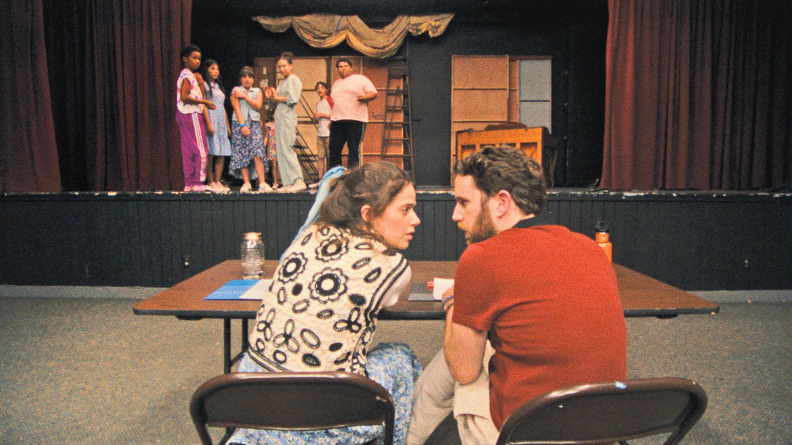 Mollie Gordon and Ben Platt star in Theater Camp.