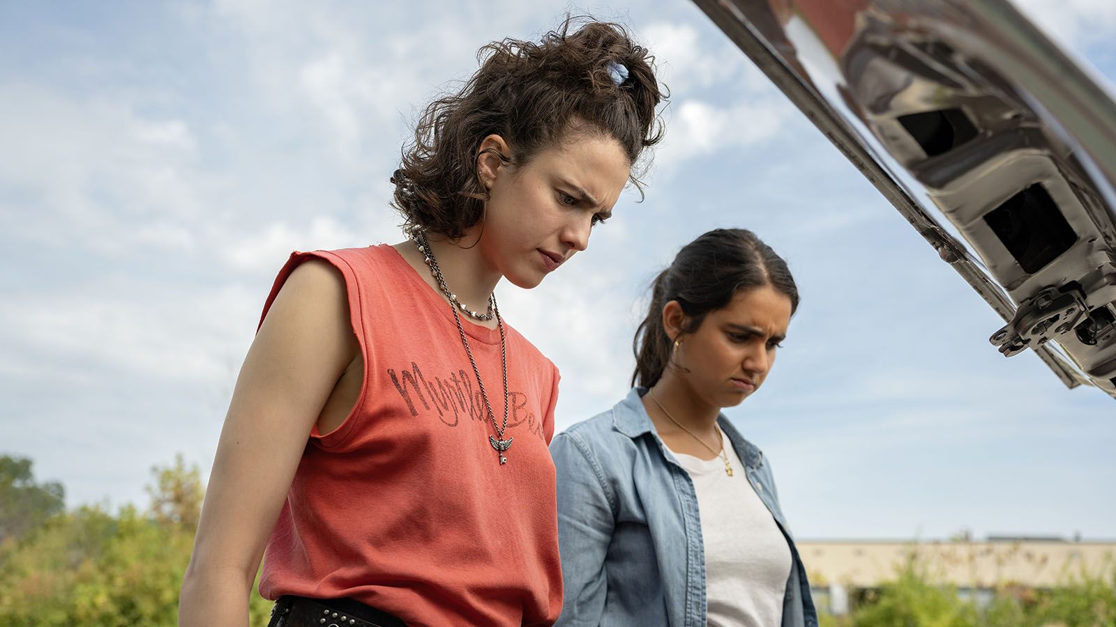 Margaret Qualley, left, and Geradline Viswanathan star in the new comedy Drive-Away Dolls.