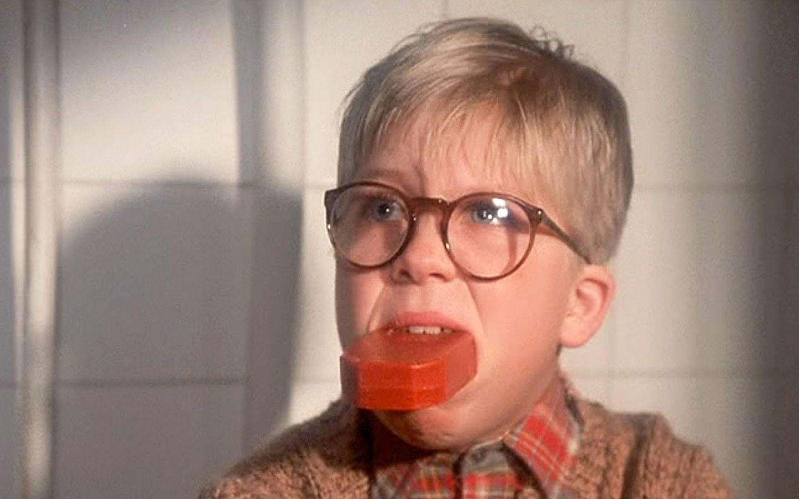 Ralphie, played by a young Peter Billingsley, washes his mouth out with soap after being caught cursing in the movie A Christmas Story. Billingsley will be at Embassy Theatre on Thursday, Dec. 19, for a screening of the film and a question-and-answer session.